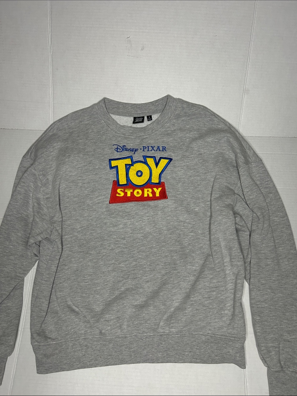 Disney Pixar size small Toy  Story  embroidered crewneck sweatshirt